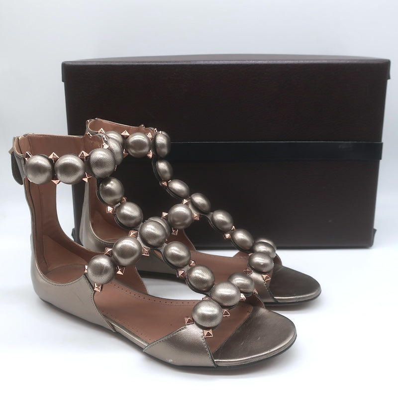 Alaia La Bombe Studded Flat Gladiator Sandals Rhodium Metallic Leather Size 37.5