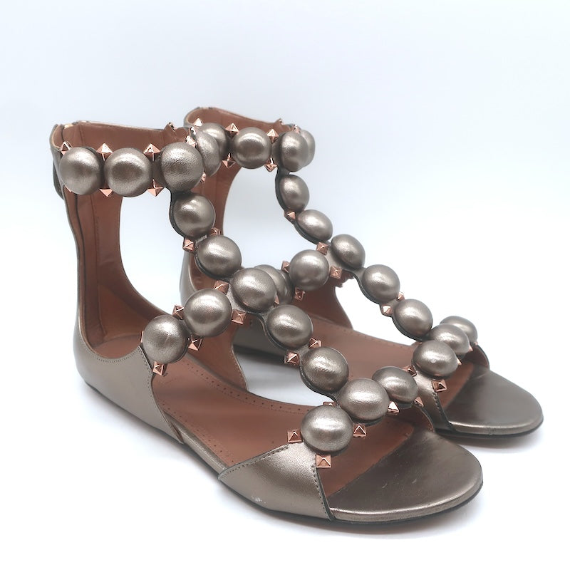 Alaia La Bombe Studded Flat Gladiator Sandals Rhodium Metallic Leather Size 37.5