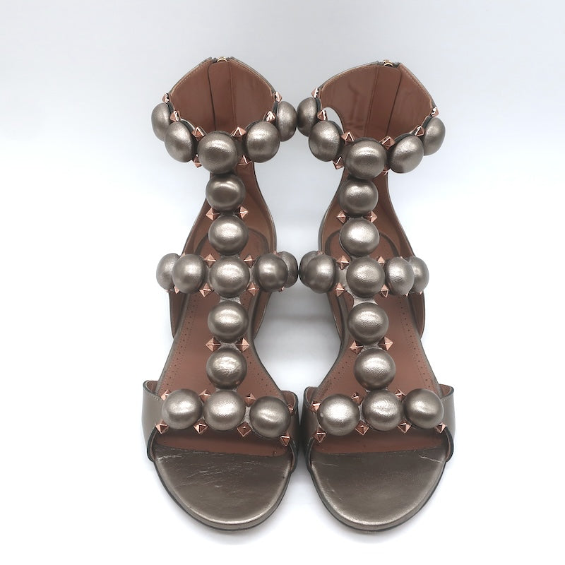 Alaia La Bombe Studded Flat Gladiator Sandals Rhodium Metallic Leather Size 37.5