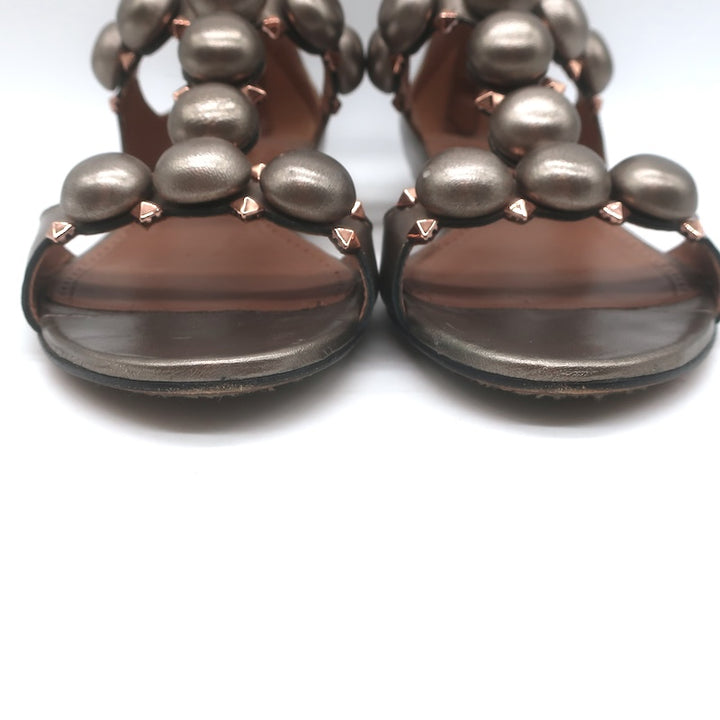 Alaia La Bombe Studded Flat Gladiator Sandals Rhodium Metallic Leather Size 37.5
