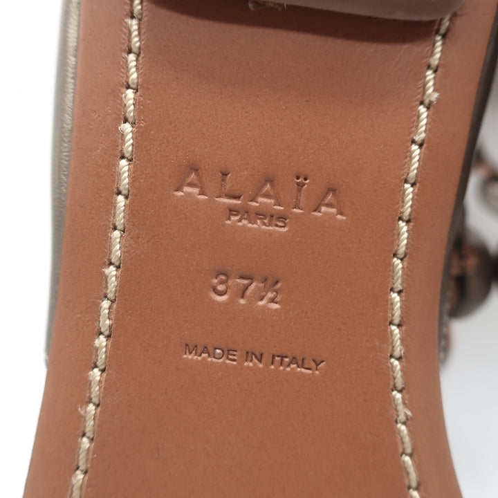 Alaia La Bombe Studded Flat Gladiator Sandals Rhodium Metallic Leather Size 37.5