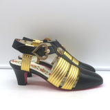 Authentic Gucci Gea T-strap pumps in black leather with gold accents and faux pearls, pre-owned (new with tags)