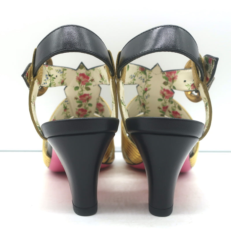 Gucci Gea faux pearl T-strap pumps in black leather with gold trim, authentic pre-owned luxury