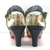 Gucci Gea faux pearl T-strap pumps in black leather with gold trim, authentic pre-owned luxury