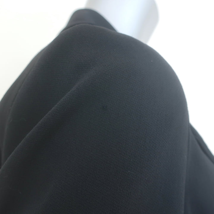 The Row double-breasted blazer, black stretch wool (size 4), authentic pre-owned, gently worn luxury piece