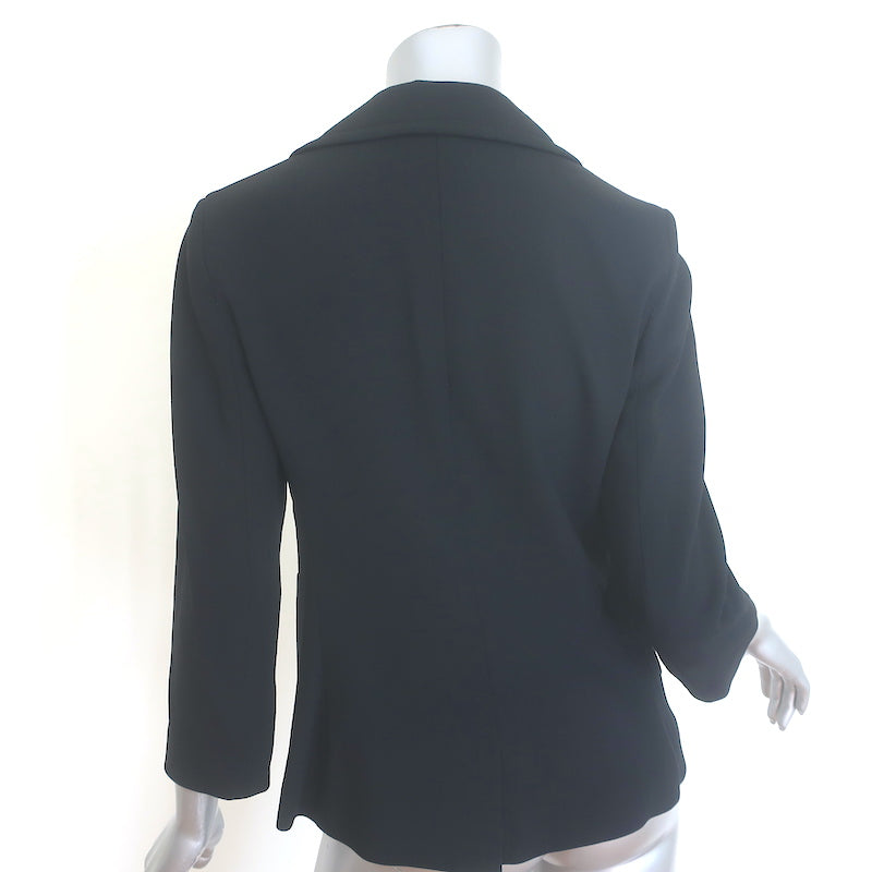 The Row double-breasted black stretch-wool blazer, size 4, authentic pre-owned and gently worn luxury piece
