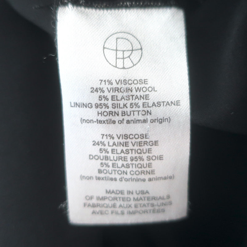 The Row double-breasted blazer, black stretch wool, size 4 — authentic pre-owned luxury piece, gently worn.