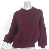 Khaite Margaux cashmere blouson-sleeve sweater in merlot, size small — gently pre-owned luxury piece