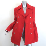 McQ Alexander McQueen double-breasted red wool-cashmere coat, pre-owned luxury piece with authentic designer detailing.