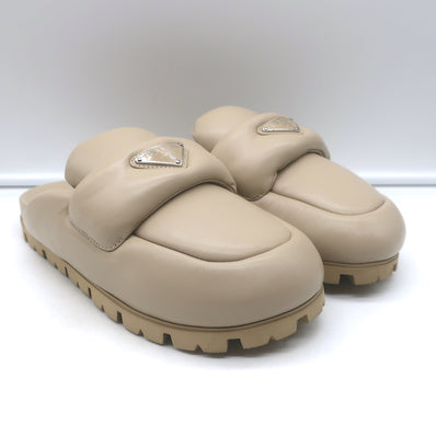 Prada triangle-logo padded flat mules in nude leather - pre-owned, authentic luxury