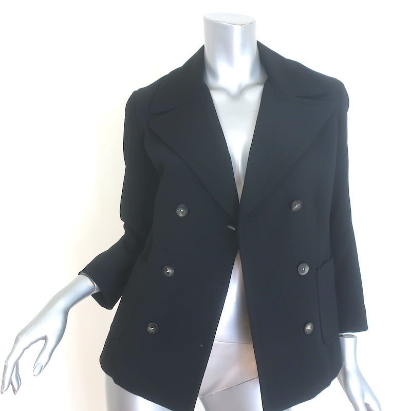 The Row double-breasted blazer in black stretch wool, size 4 — authentic pre-owned luxury piece.