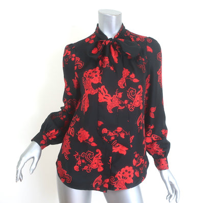 Tory Burch silk bow blouse, black with red paisley print, size 2 — pre-owned, gently worn luxury top