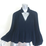 Veronica Beard Walker pleated blouse in navy with blouson sleeves — pre-owned, gently worn luxury piece