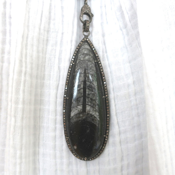 The Woods Beaded Fossil Pendant Necklace on Leather Black