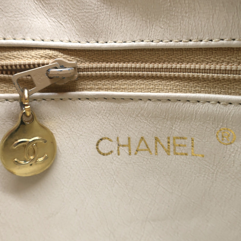 SOLD Chanel 1980s Ivory Chevron Kiss Lock Center Chain Handle Bag