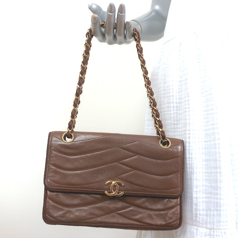 Brown leather chanel clutch with stitching Clearance