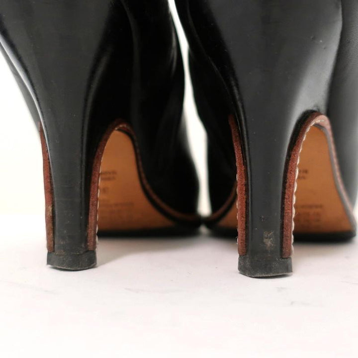Maison Martin Margiela Pointed Toe Ankle Boots Black Leather Size 37.5 available at CelebrityOwned.com img_8