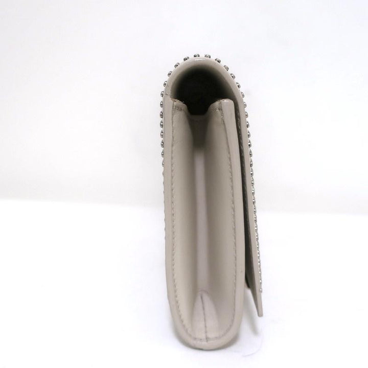 Saint Laurent Lutetia Clutch Off-White Studded Leather Flap Bag available at CelebrityOwned.com img_3
