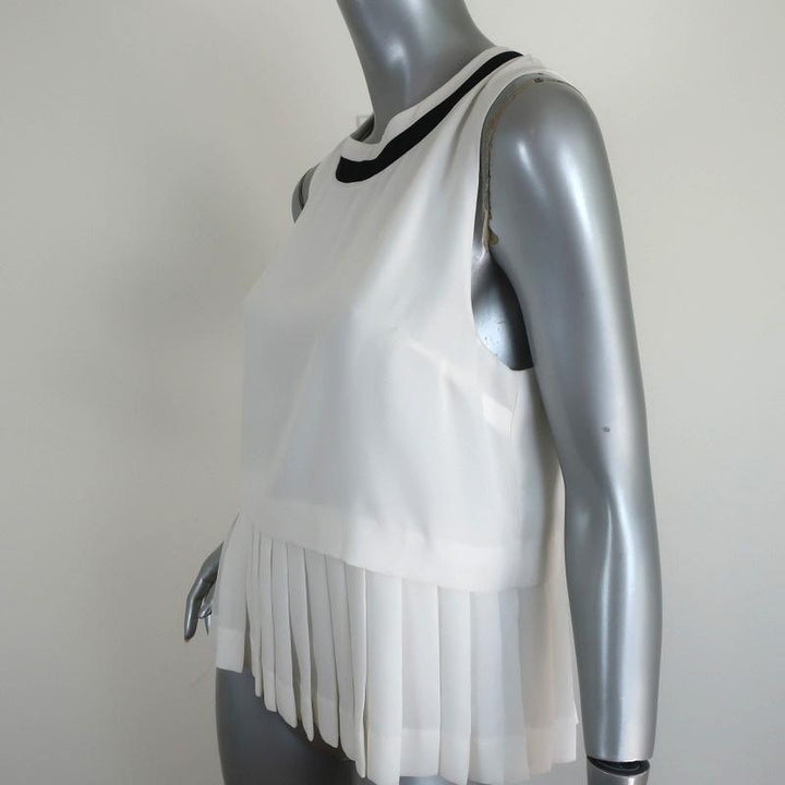 Timo Weiland Peplum Top White Pleated Georgette Size 6 Sleeveless Blouse available at CelebrityOwned.com img_3