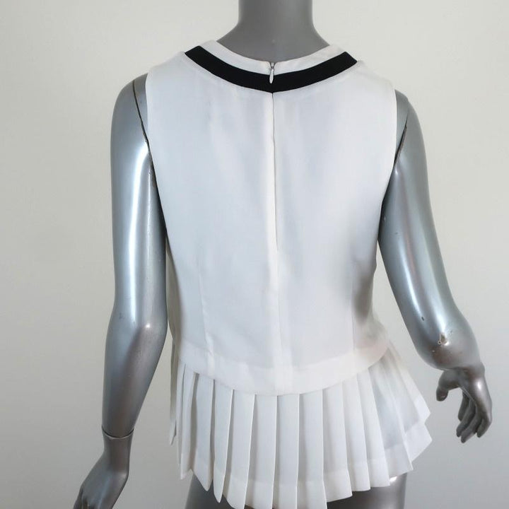 Timo Weiland Peplum Top White Pleated Georgette Size 6 Sleeveless Blouse available at CelebrityOwned.com img_5
