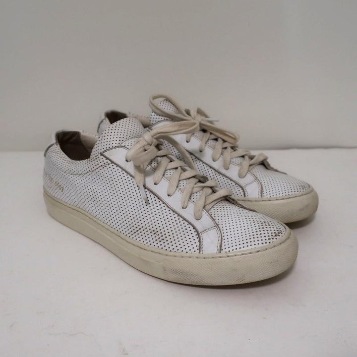 Woman by Common Projects Achilles Low Sneakers White Perforated Leather Size 38 available at CelebrityOwned.com img_1