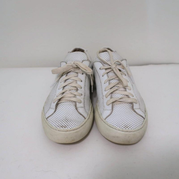 Woman by Common Projects Achilles Low Sneakers White Perforated Leather Size 38 available at CelebrityOwned.com img_4