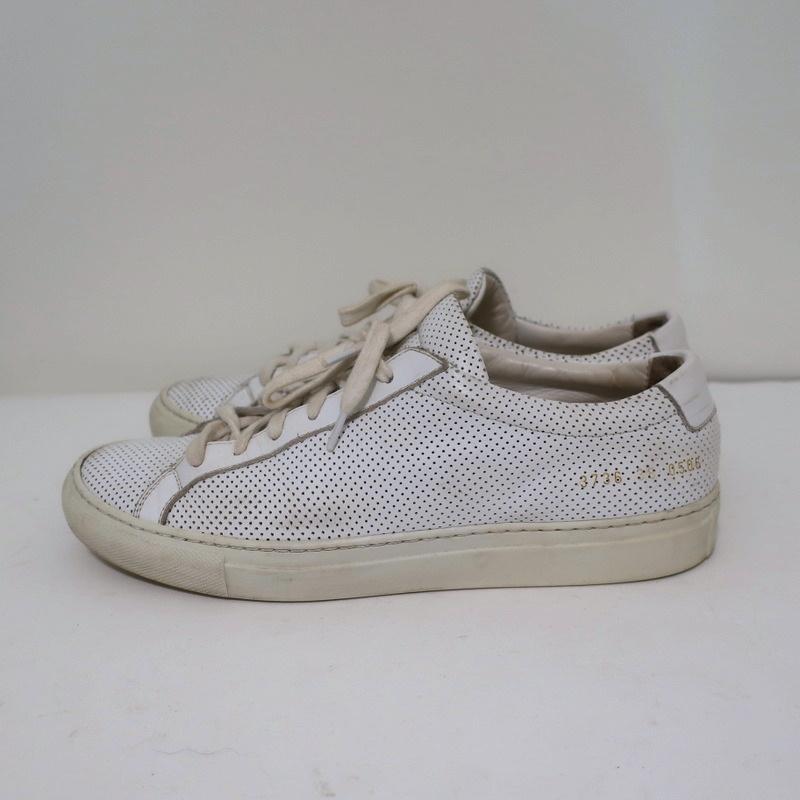 Woman by Common Projects Achilles Low Sneakers White Perforated Leather Size 38 available at CelebrityOwned.com img_6