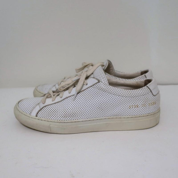 Woman by Common Projects Achilles Low Sneakers White Perforated Leather Size 38 available at CelebrityOwned.com img_6