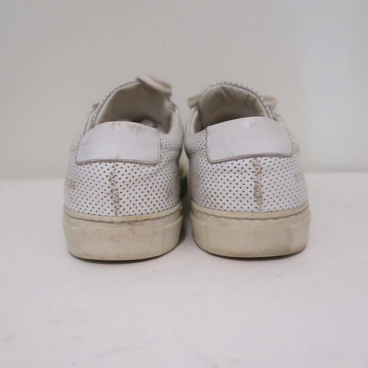 Woman by Common Projects Achilles Low Sneakers White Perforated Leather Size 38 available at CelebrityOwned.com img_8